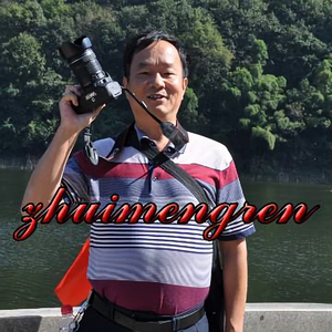 爱摄影爱唱歌的追梦人头像