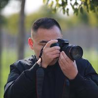 飞飞哥春天的哥头像